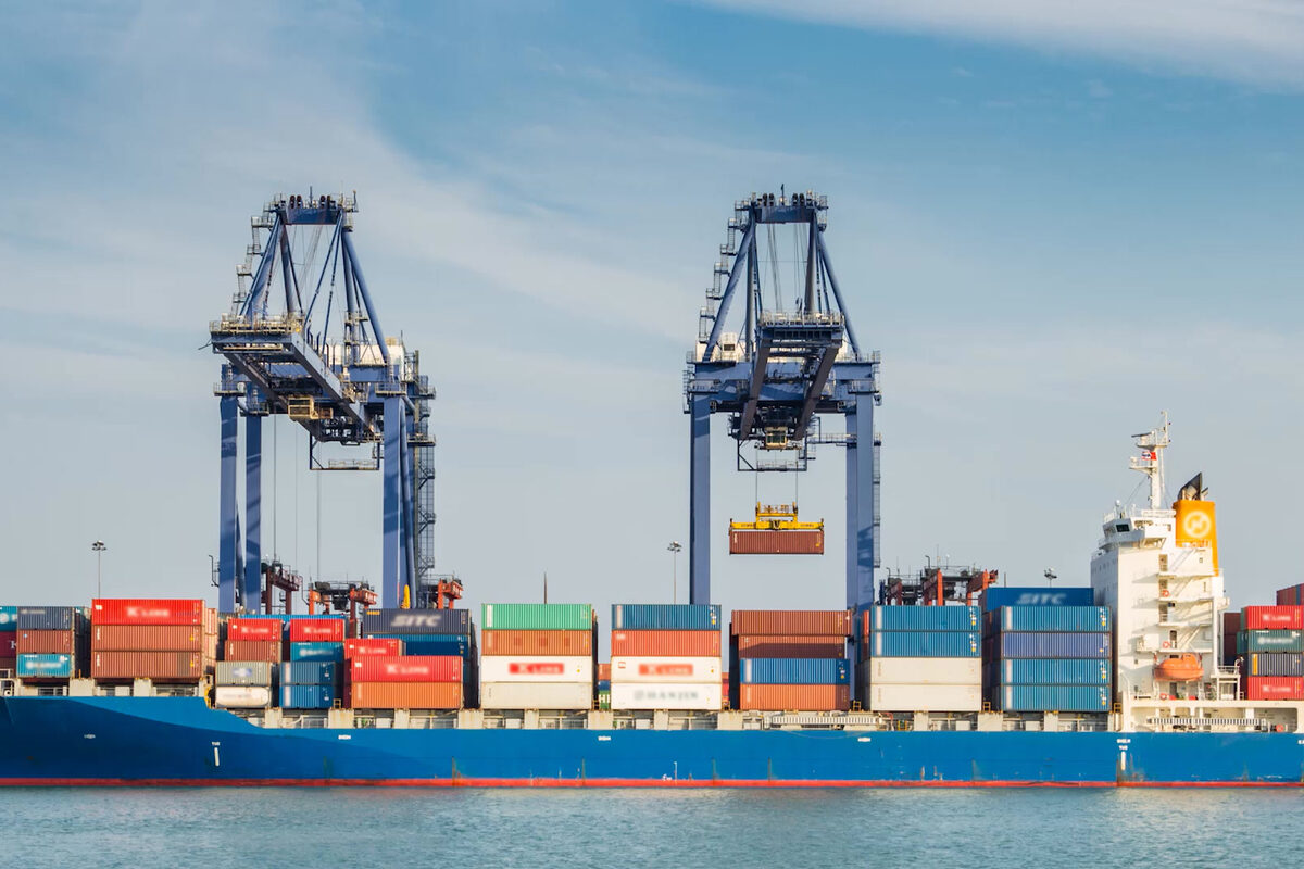 Container ship being loaded at a commercial port